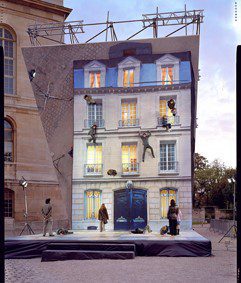 Leandro Erlich, Bâtiment (2004). A building facade laid flat under a mirror suspended at a 45-degree angle. Dimensions variable. Fourteen different facades each specific to the city that hosted the temporary installation. Nuit Blanche, Paris, France, 2004. Courtesy Galleria Continua